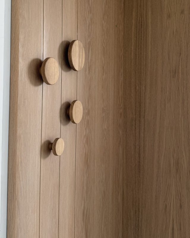 Solid oak panelling with turned oak pegs